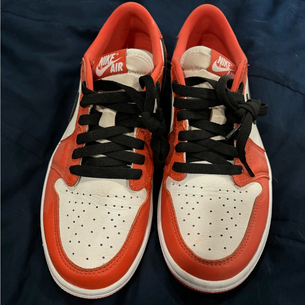 Worn one time. Orange Jordan 1s low